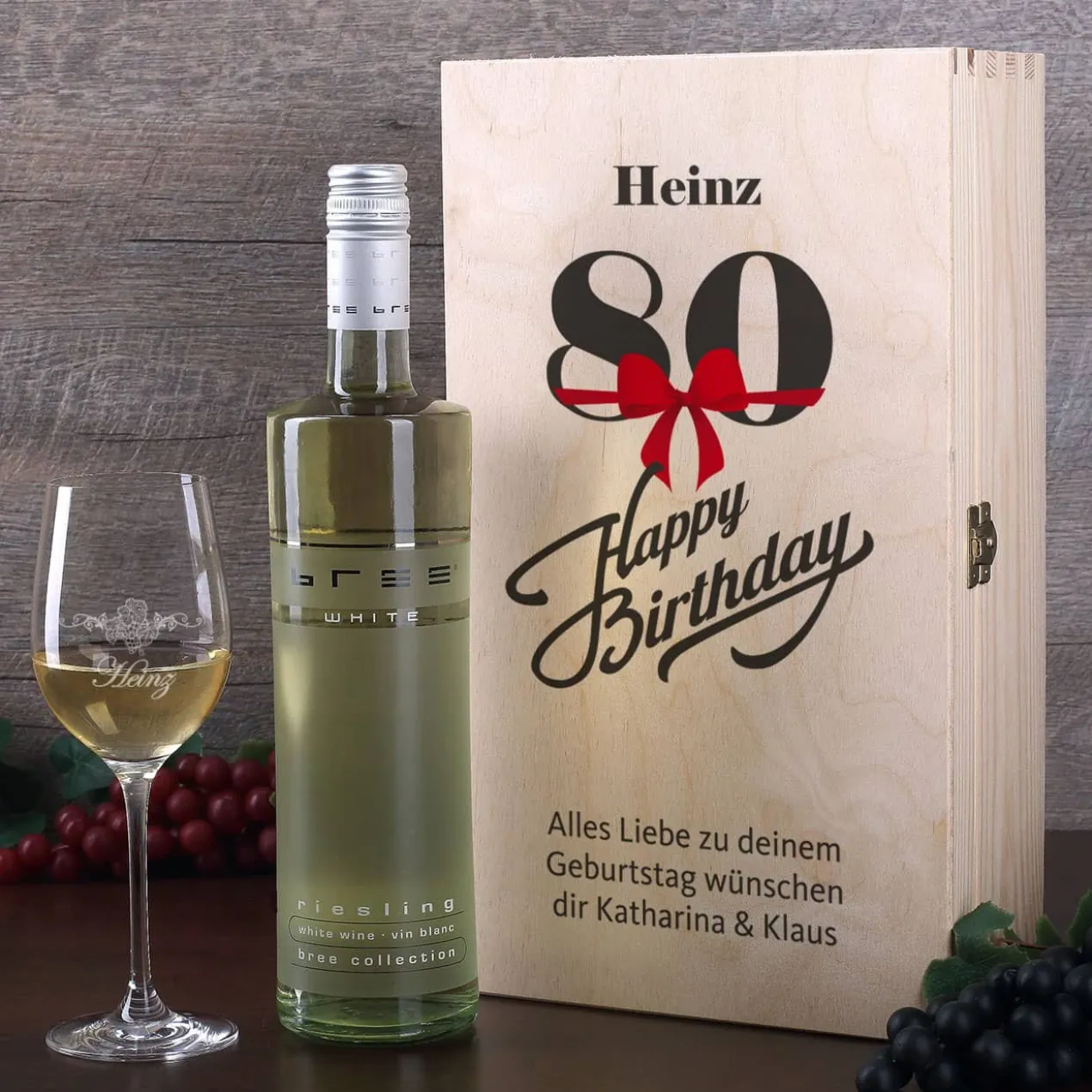 Weingeschenkset zum 80. Geburtstag mit graviertem Weinglas und Flasche in bedruckter Holzbox