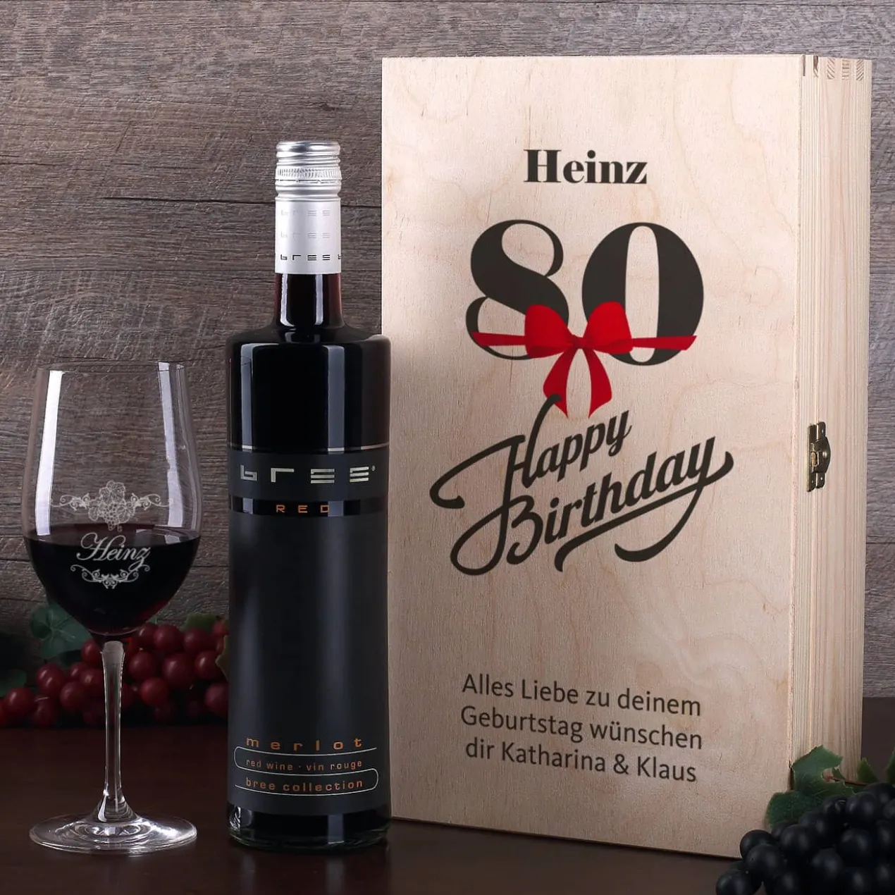 Weingeschenkset zum 80. Geburtstag mit graviertem Weinglas und Flasche in bedruckter Holzbox