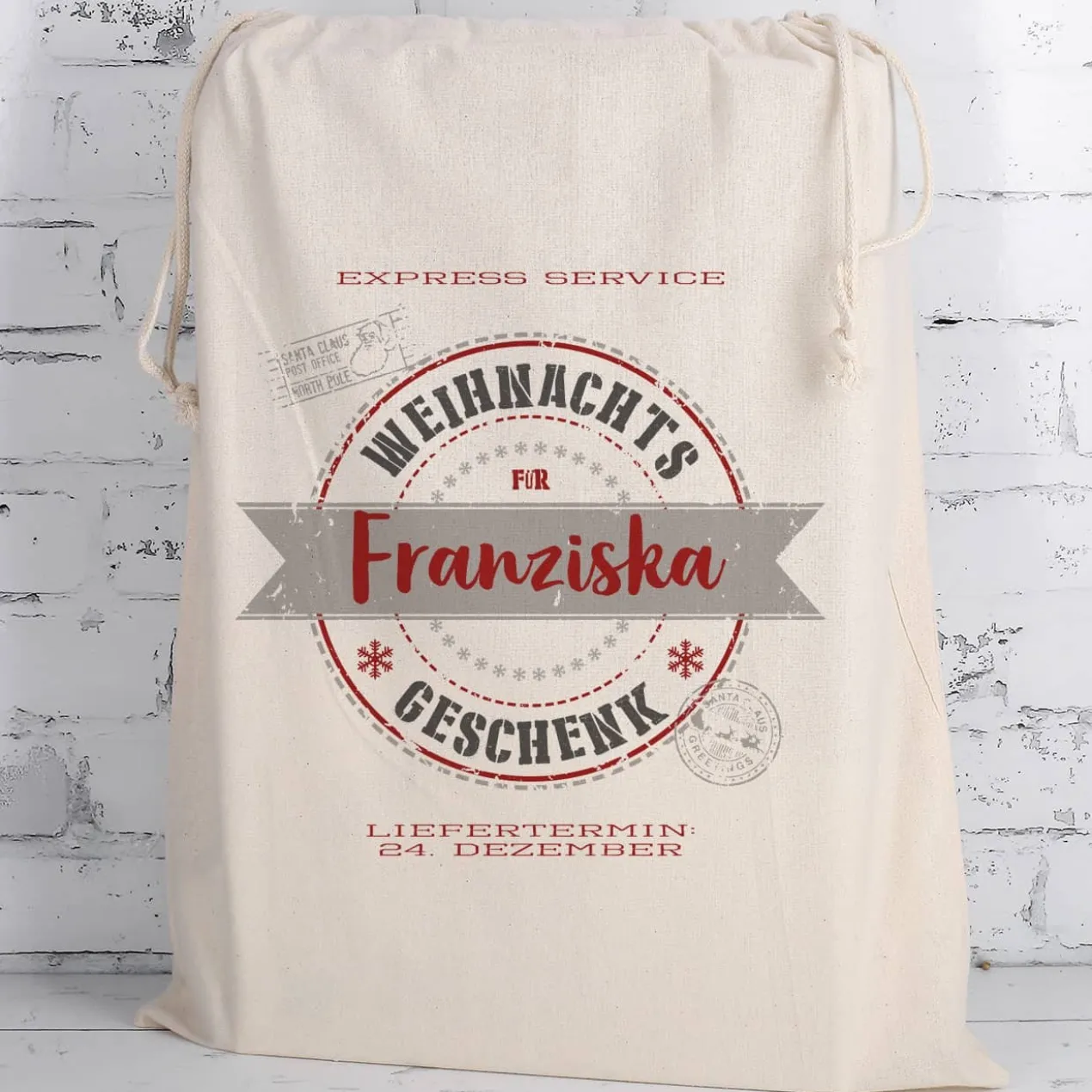 WMF Besteckset mit 24 Teilen und persönlichem Geschenksack zu Weihnachten