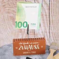Ziegelstein-Geldclip als Geschenk zum Einzug