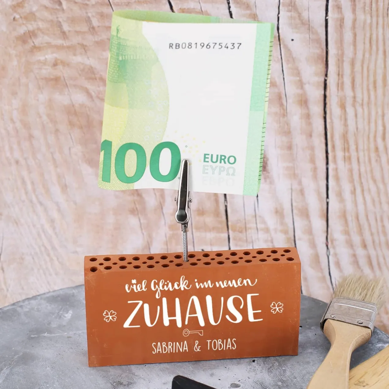 Ziegelstein-Geldclip als Geschenk zum Einzug